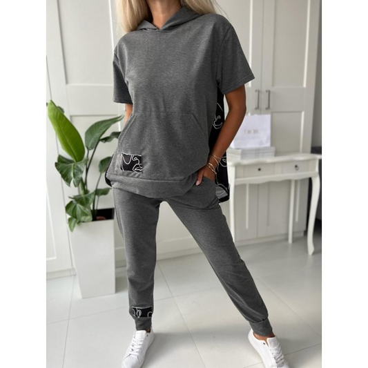 Women's set Alena in graphite by ToroModa  https://www.toromoda.com/products/womens-set-alena-in-graphite  A set of short-sleeve, long-back hooded sweatshirt and cuffed track pants.Material: cotton with elastaneProducer: ToroModa
